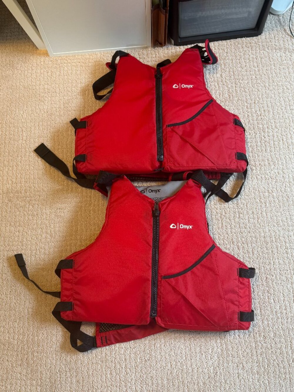 Two Onyx adult oversize life jacket